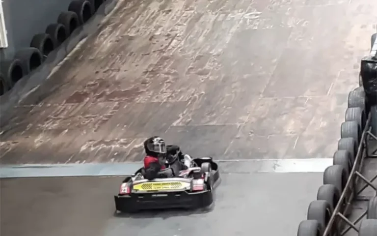 Young Mind racing a kart with GYM